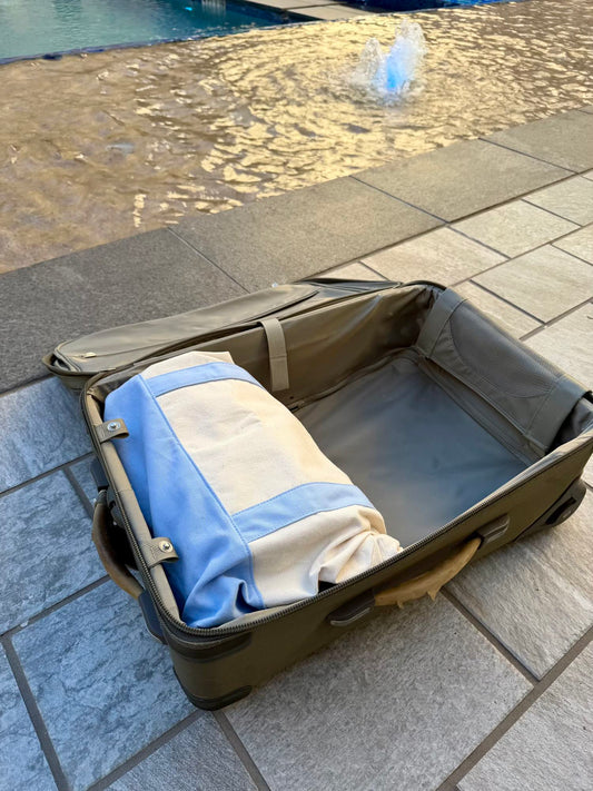 A full-size travel mahjong set by Spools fitting perfectly in a carry-on with plenty of room to spare before a cruise.