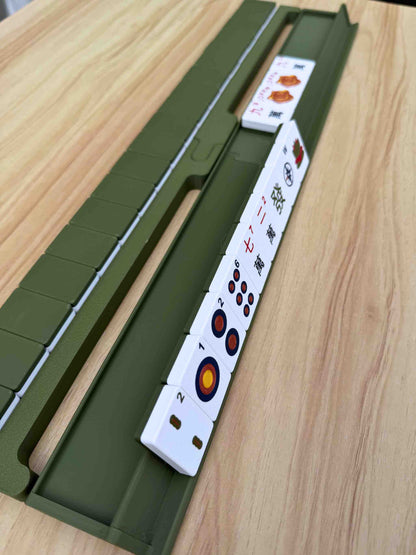 Travel Mahjong Racks, Pushers, and Tiles in a color coordinated wall