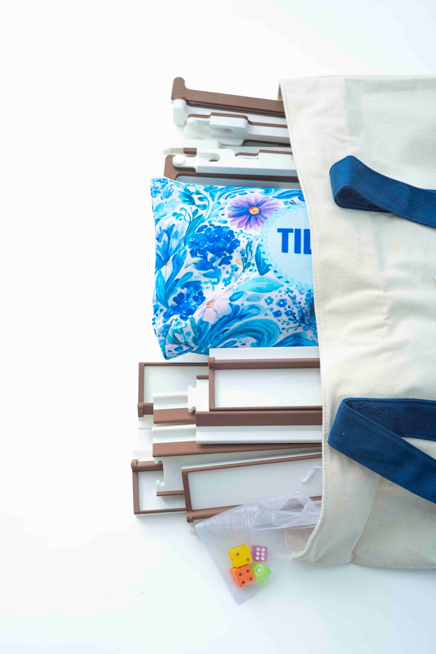 A canvas tote holding mahjong tiles
