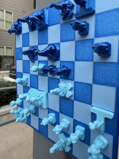 A closer angle shows dark and pale blue dog-shaped pieces gripping the vertical magnetic Fridge Chess board.