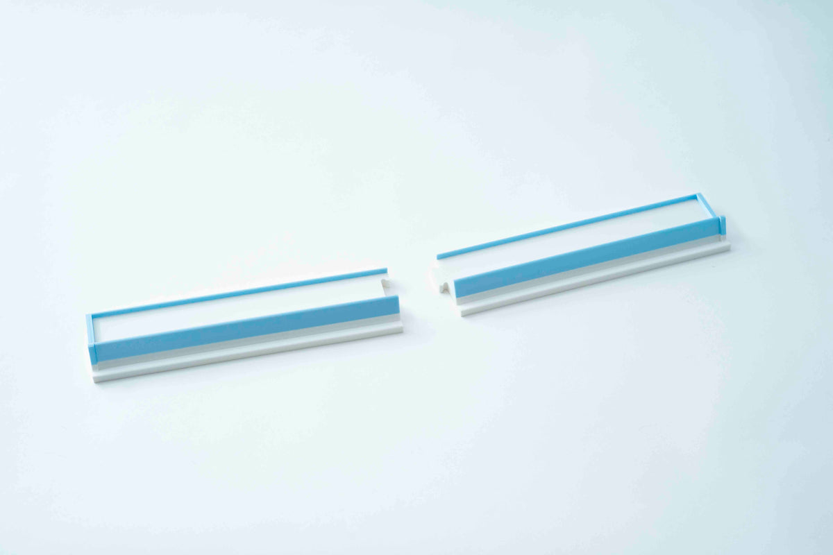 Mahjong racks that split in two for travel