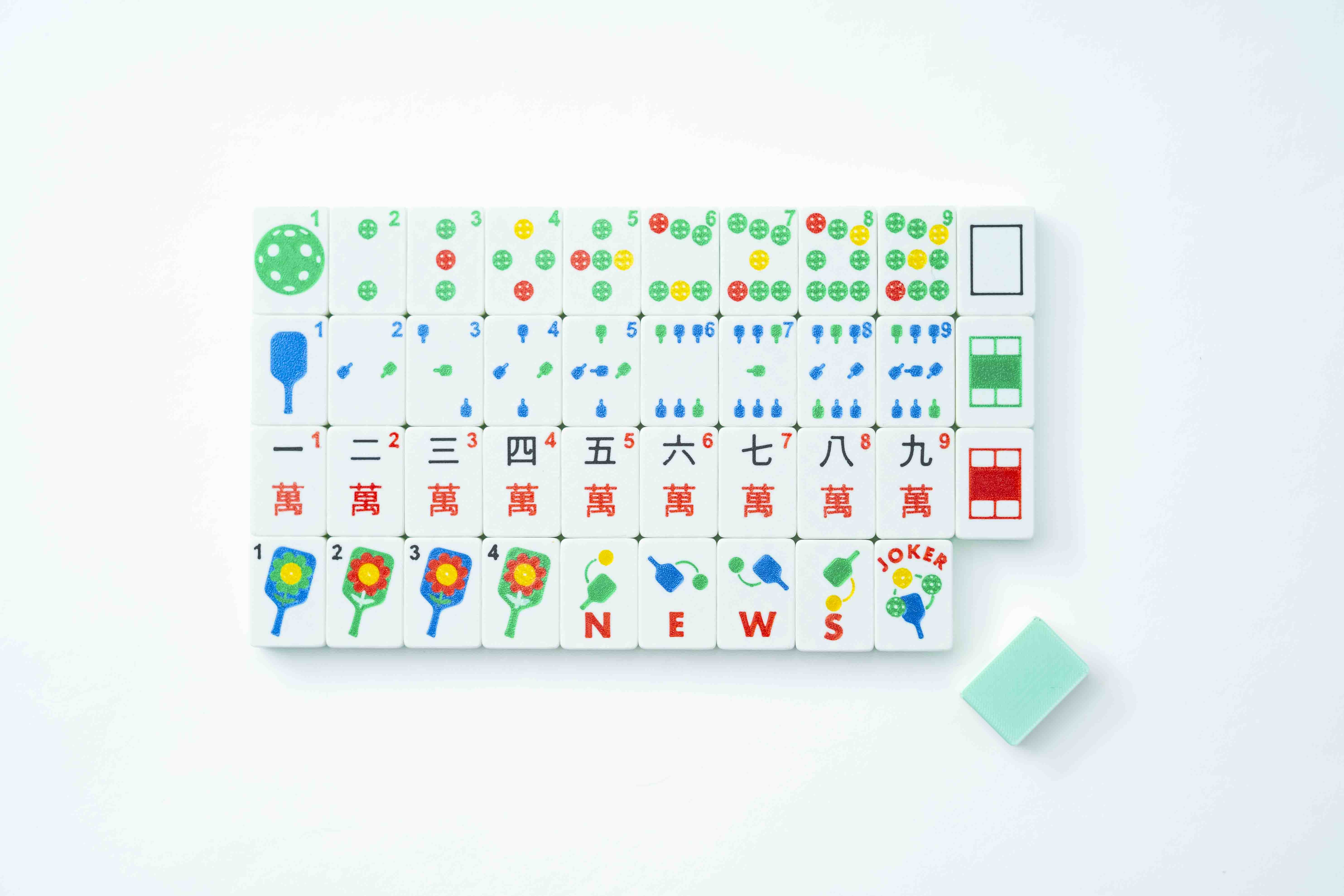 Travel Mahjong Tiles Pickleball set from Spools with pickleball motifs in mint green