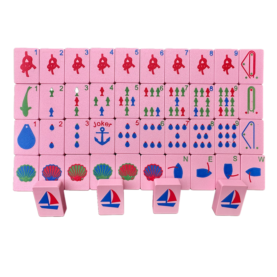 Set of pink mahjong travel tiles with a nautical theme.