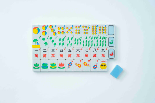 A set of white and light blue Mahjong Tiles with colorful summer-themed illustrations and Chinese numerals, arranged on a light gray background with a small blue card beside them.