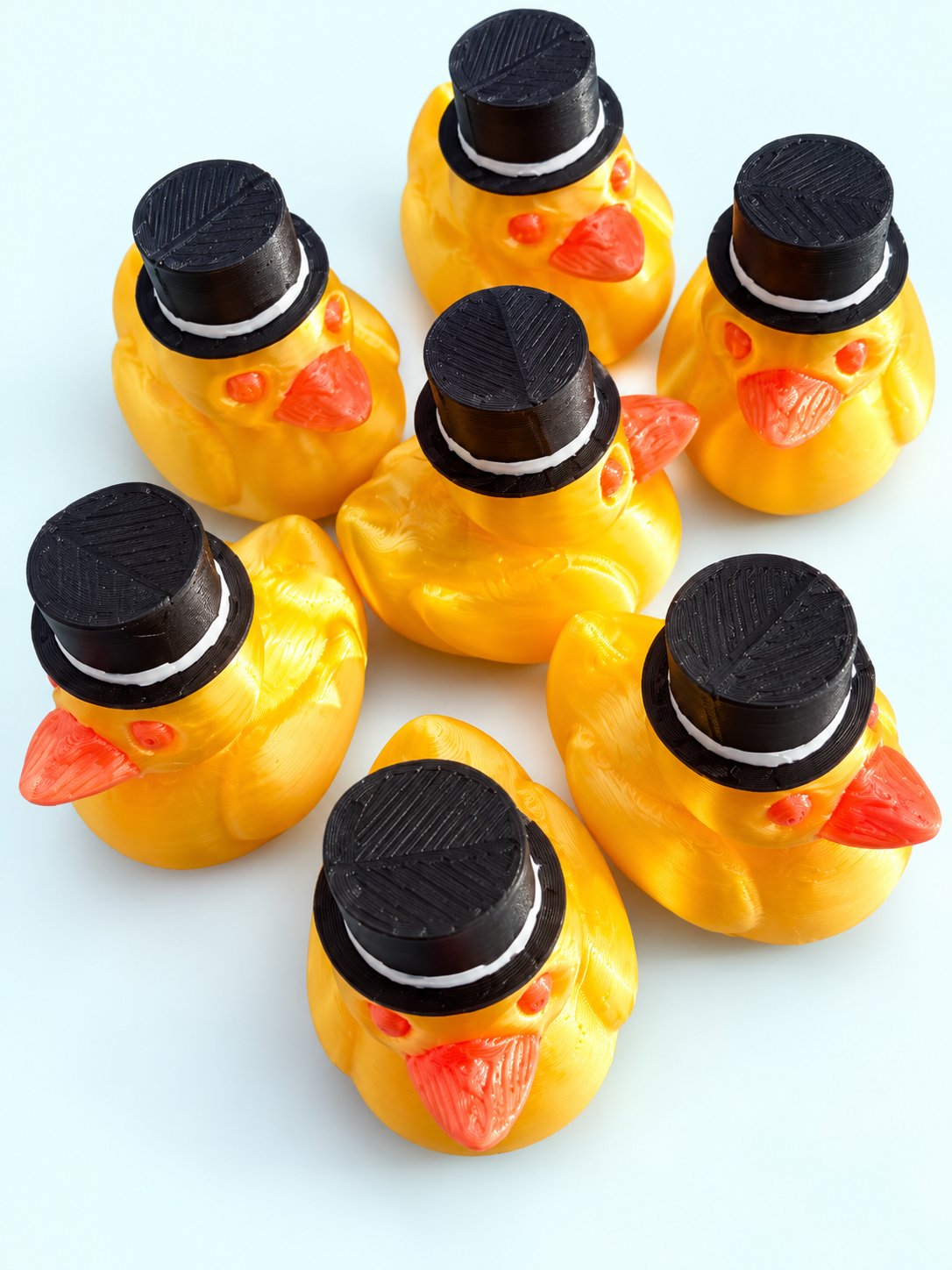 Close-up of top hat duck mahjong trinkets by Spools