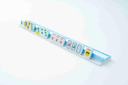 Travel mahjong racks with full-size, lightweight american mahjong tiles shown.