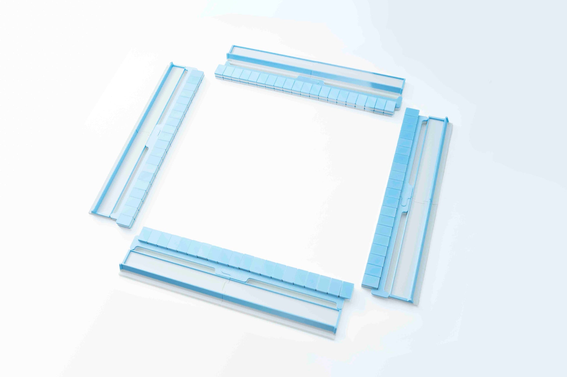 Tiles, Racks, and Pushers for the light blue pool mahjong set
