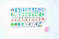 Full set of Spools Compass mahjong tiles laid out in rows, one pink tile back showing