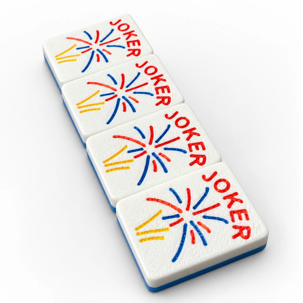 Four Spools mahjong joker tiles with red, blue and yellow firework bursts and red JOKER lettering, white faces with blue backs, angled view
