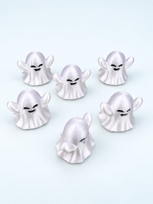 Group of 3D-printed ghost mahjong trinkets from Spools