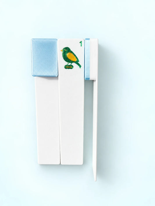 Light blue 1 Bam mahjong tile bookmark by Spools with its page clip