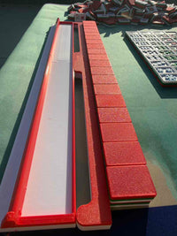 Holiday red travel mahjong bundle: four racks, four pushers, canvas tote, and floral tile pouch